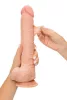 RealStick Dildó Realisztikus, mozgatható tetejű, állítható 28,5 cm hús színű