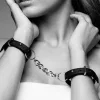 Bijoux Indiscrets – fekete készítettek a rögzítő kézbilincsek