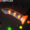 PRETTY LOVE - világító narancssárga dildó vibráció nélkül