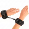 KINK – állítható fekete csipkés csuklómandzsetta